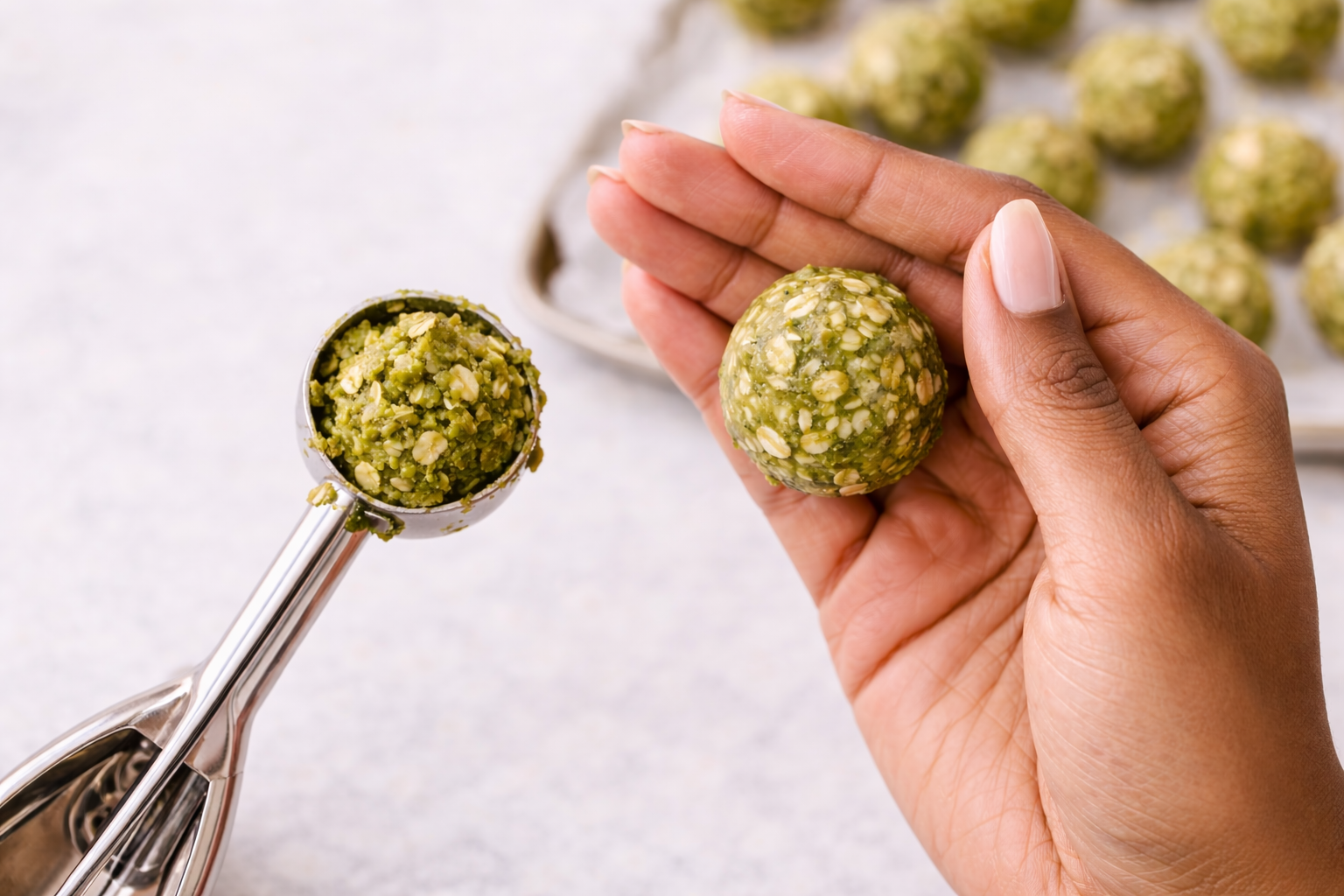 Rolling matcha energy bites by hand