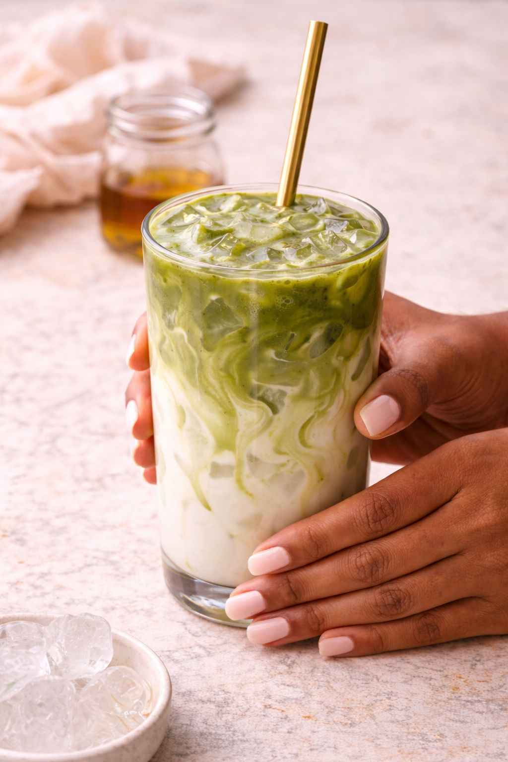 Finished iced vanilla matcha latte ready to drink