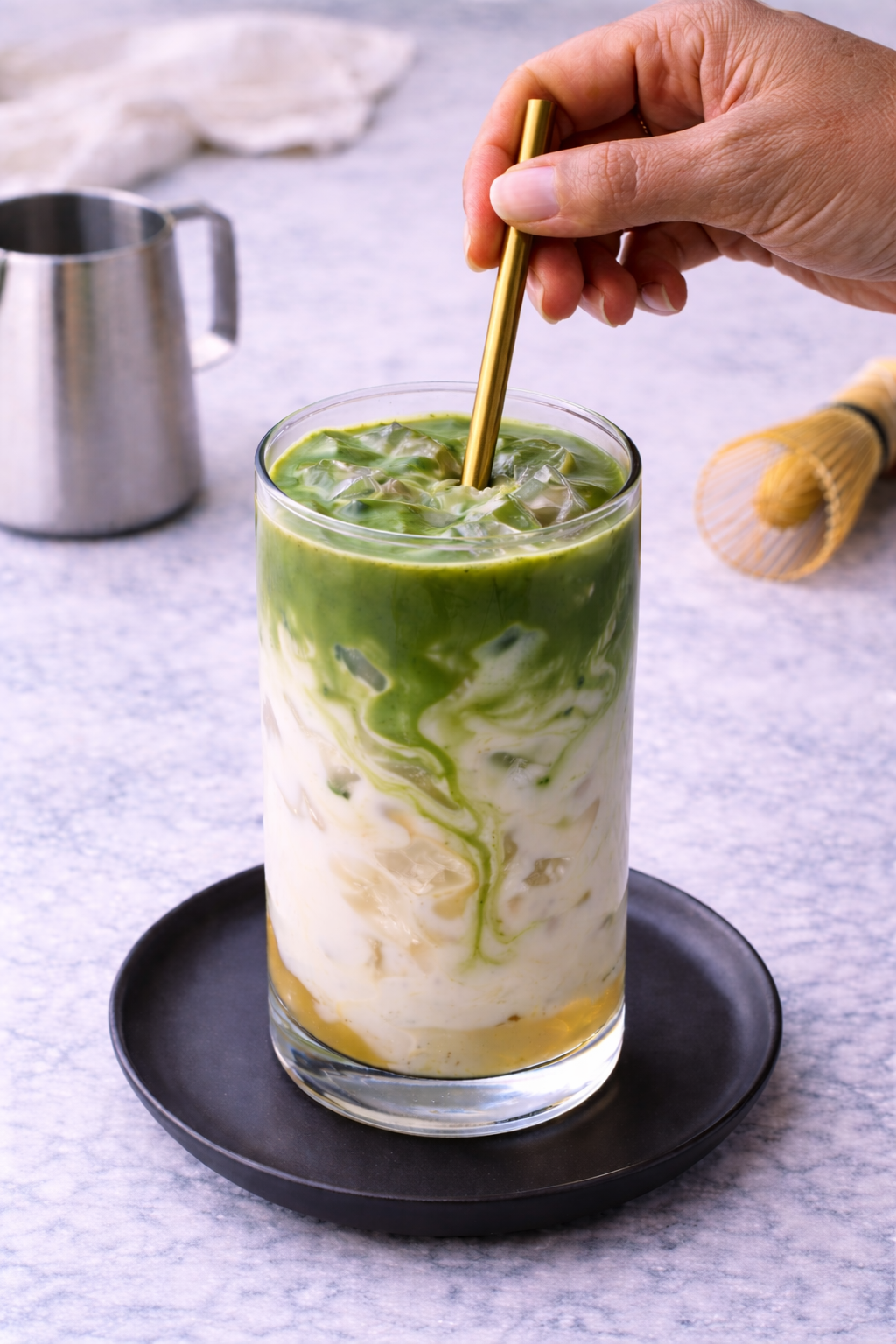 Step 6: Stirring and serving a smooth and creamy iced matcha latte