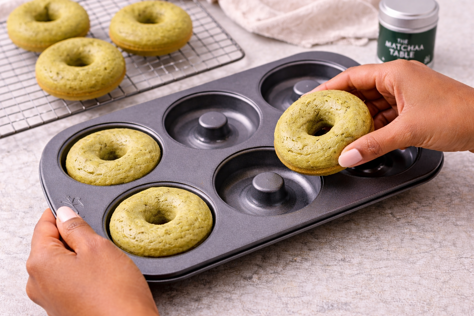 Step 6: Removing baked matcha donuts from the pan